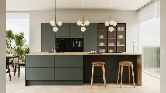 Silk by Designa køkken i grøn med riflet glas i sort alu-ramme